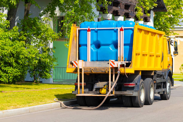 istock a large watering machine fills a tank with water 1516876192