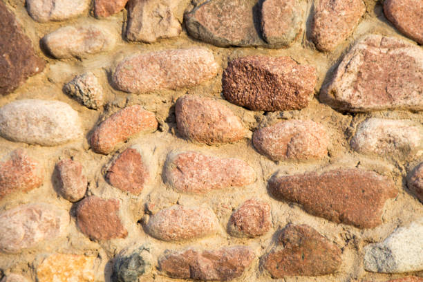 Texture of stone old wall. Natural background. surface of the marble with brown tint