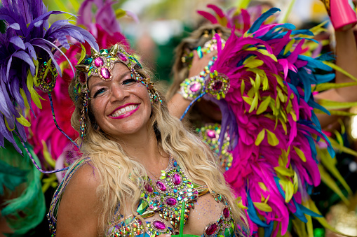 Cruz Bay, St John/US Virgin Islands-July 04, 2023: Fourth of July Carnival celebration in Cruz Bay, Costumed group of women dancing in the street in Cruz Bay.