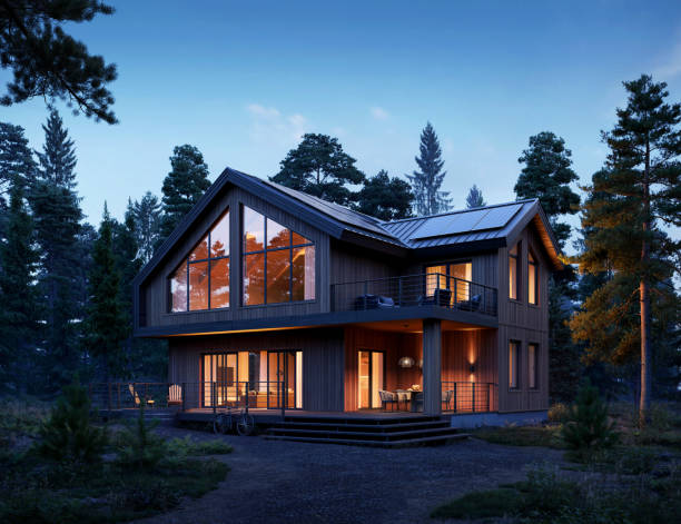 Computer generated image of a beautiful home in the forest at night stock photo