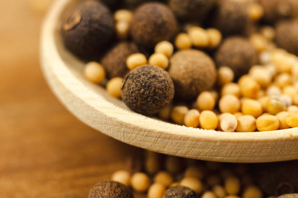 Close-up of various spices and seeds in tray