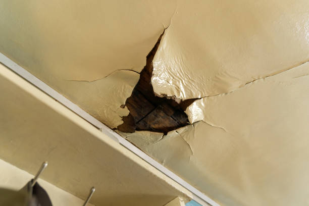 istock Broken ceiling problem in house because rain water damage in raining season. Selective focus 1516961050