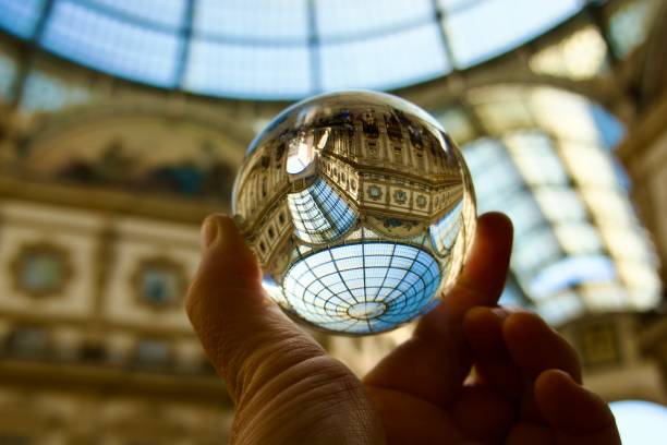 istock Crystal ball against glass ceiling 1517004933