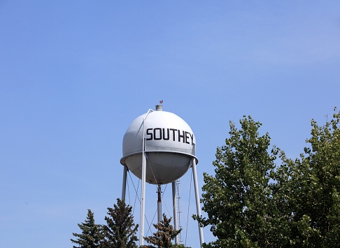 Southey , Saskatchewan, Canada- June 30,2023: Landmark water tower at Southey Saskatchewan. Can be seen from a far distance.  Southey is named after the British Poet Robert Southey.  Era 1911.