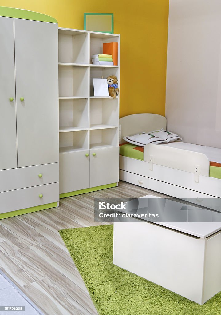 baby place Colorful room decorated with brand new furniture for children Apartment Stock Photo