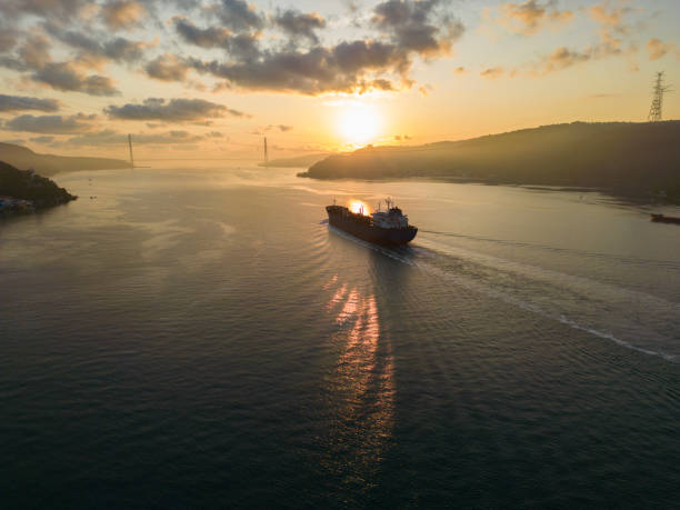istock Aerial view tanker ship with liquid bulk cargo in transit at sunrise. 1517099433