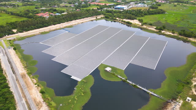 Aerial View Of Floating Solar Cell Power Plant With Solar Cell Generate The Electric On Lake