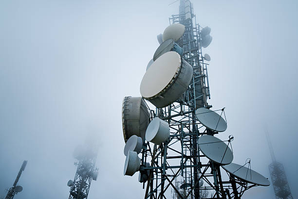 telecommunications towers stock photo