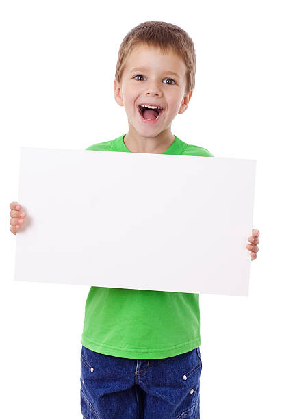 istock Young boy holding blank sign standing on white background 151713346