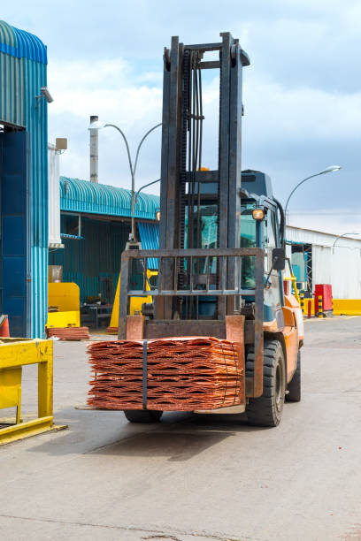 istock A forklift transporting copper cathodes at the plant of a copper mine. 1517155072
