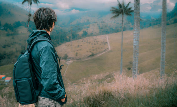 istock Boy looking at the landscape in the mountains 1517158570