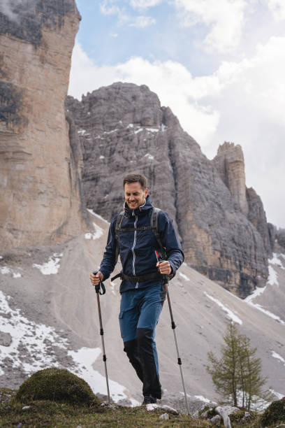 istock Active Caucasian man, hiking through Dolomites Tre Cime di Lavaredo 1517160254