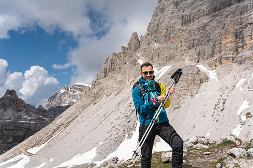 Portrait of a proud Caucasian man, during his hike through the Dolomites Tre Cime di Lavaredo
