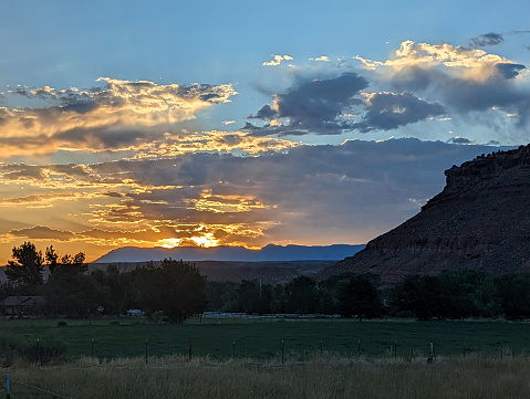 Hay pastures in late afternoon at sunset in Rockville Utah early summer 2023