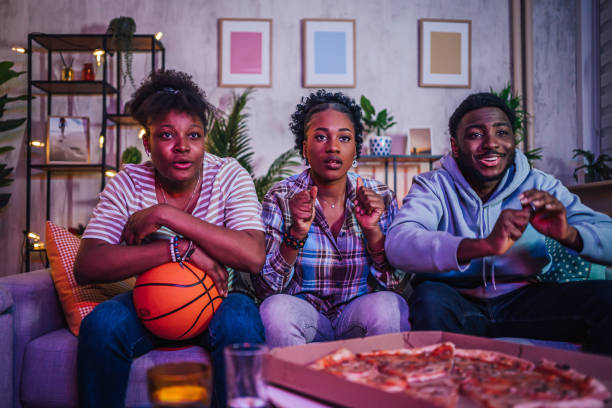 istock Friends watching a soccer match at home 1517207305