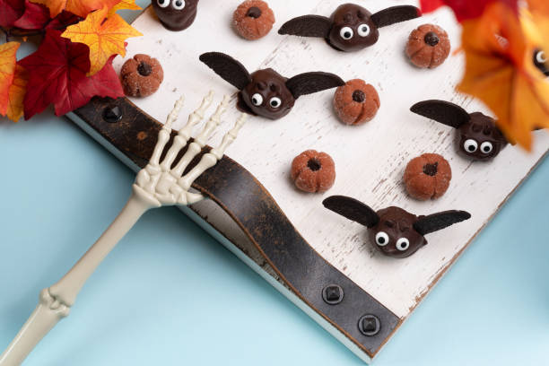 Chocolate truffle bats and pumpkin spiced mini pumpkin cheesecakes.