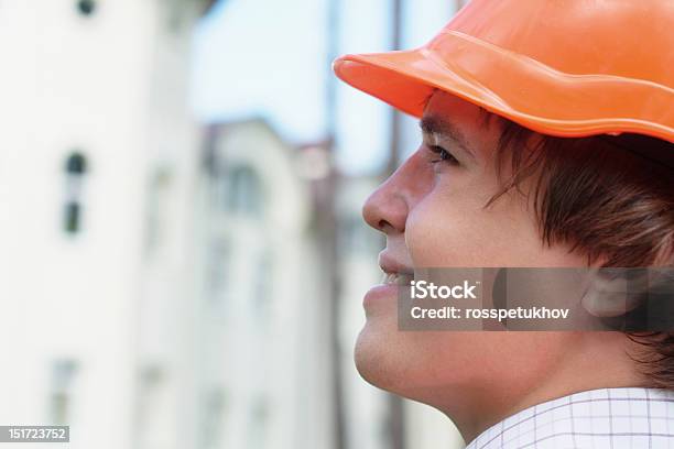 Closeup Photo Of Smiling Young Worker Outdoors Stock Photo - Download Image Now - Adult, Adults Only, Blue-collar Worker