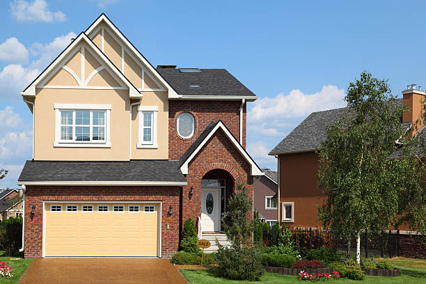 istock New cottage with lawn in the left. 151724684