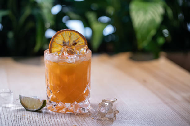 istock lemonade in glass or refreshing drink with orange juice, lime and ice on table 1517259229