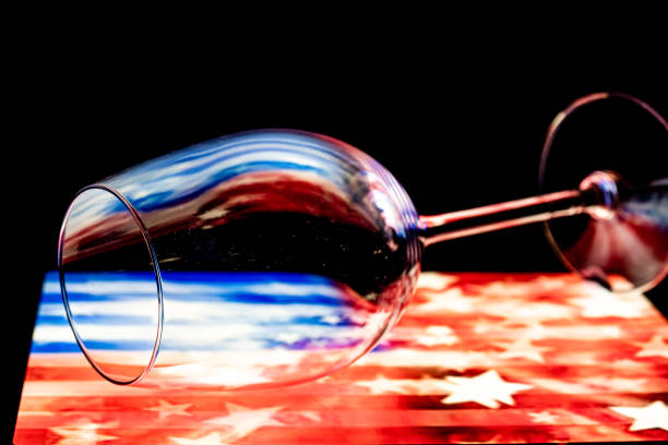 istock Empty Wine Glass On The American 'Stars & Stripes' Flag 1517260051