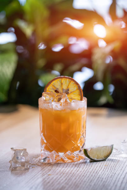 istock lemonade in glass or refreshing drink with orange juice, lime and ice on table 1517261024