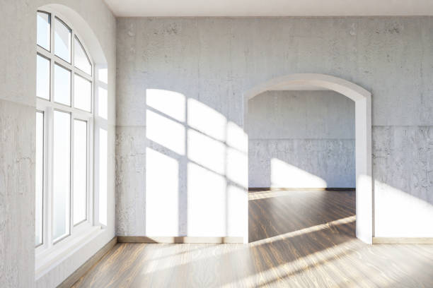 istock luxurious loft apartment with arched window and minimalistic interior living room design; 3D Illustration 1517270916