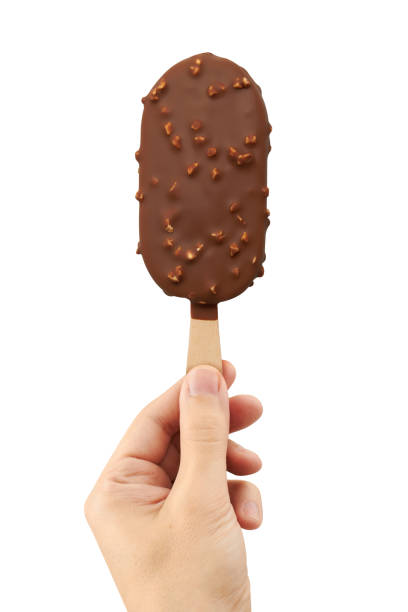 istock Ice cream in hand isolated on a white 1517346801