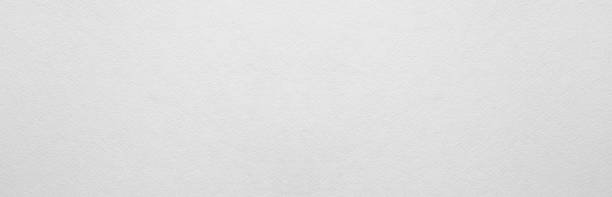 istock White textured paper. Kraft paper texture sheet, abstract background, wrapping texture. Texture of paper for suitable for any design. Paper banner 1517378289