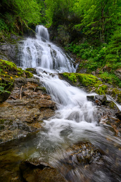 istock Beautiful waterfall in the mountains 1517446689