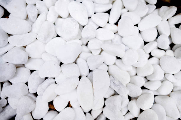 A white gravel stone pattern, perfect for backgrounds, textures and construction related themes.