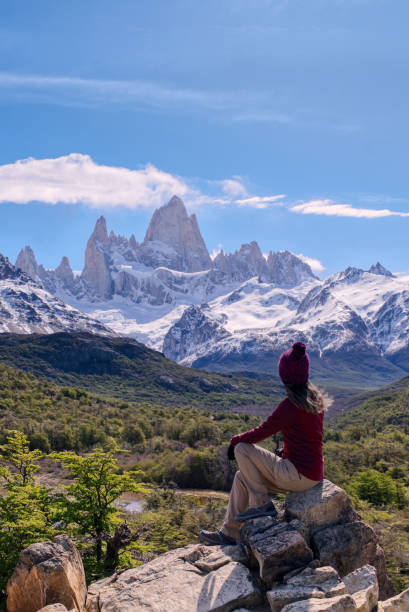istock Woman sitting on the point view overlooking Mount Fitz Roy 1517632905