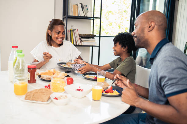 istock Happy family spends quality time together during breakfast 1517659200