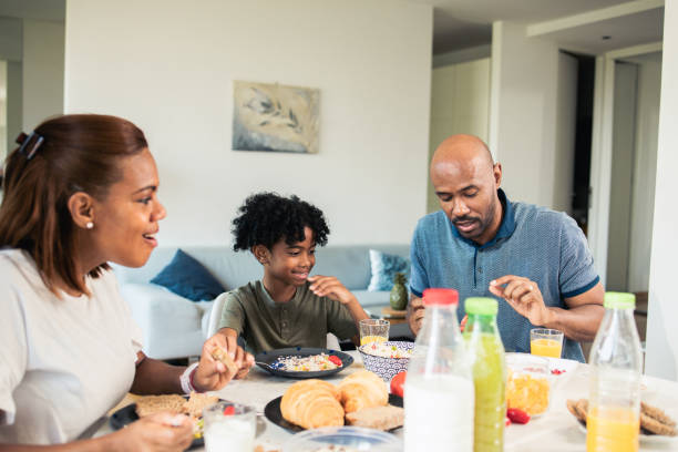 istock Family eats together and enjoys their free time 1517659207