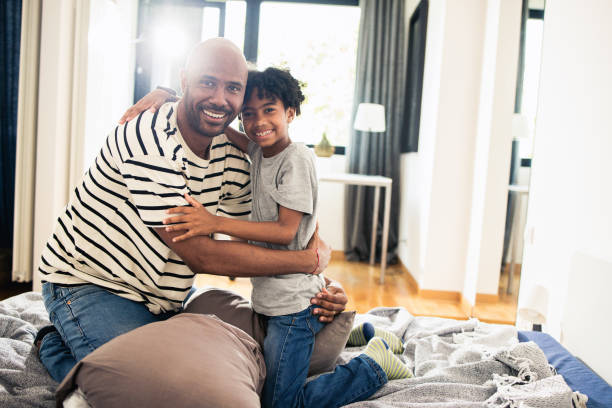 istock Young boy enjoys the time spent with his parent 1517694449