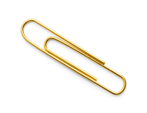 Large Brass Paperclip Cut Out on White.