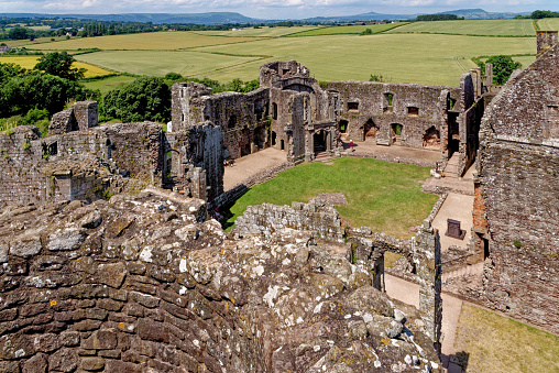 Ruins of the medieval Raglan Castle (Welsh: Castell Rhaglan) Monmothshire, Wales, United Kingdom. 25th of June 2023