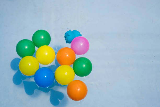 Close-up view of decorative  orange color balloons with air in a birthday