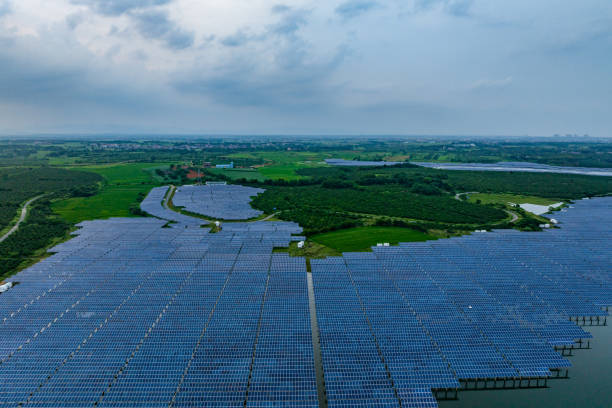 istock Solar photovoltaic panels at sunset 1517940191