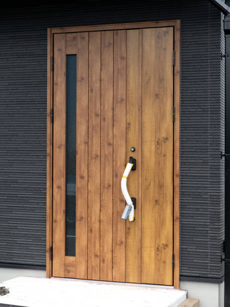 istock Door of house under construction with key box set 1518035157