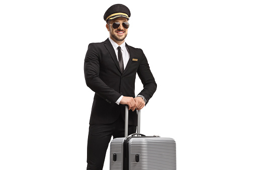 Pilot with sunglasses posing with a suitcase isolated on white background
