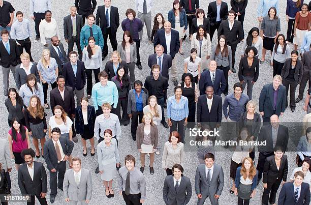Portrait Of Business People In Crowd Stock Photo - Download Image Now - Crowd of People, Multiracial Group, People