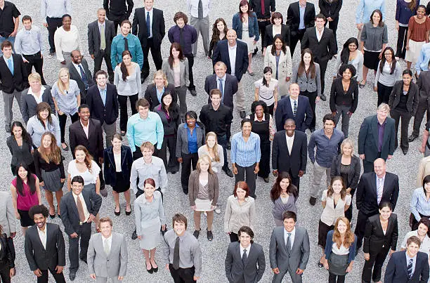 Photo of Portrait of business people in crowd