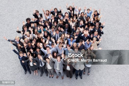 istock Portrait of waving business people 151811135