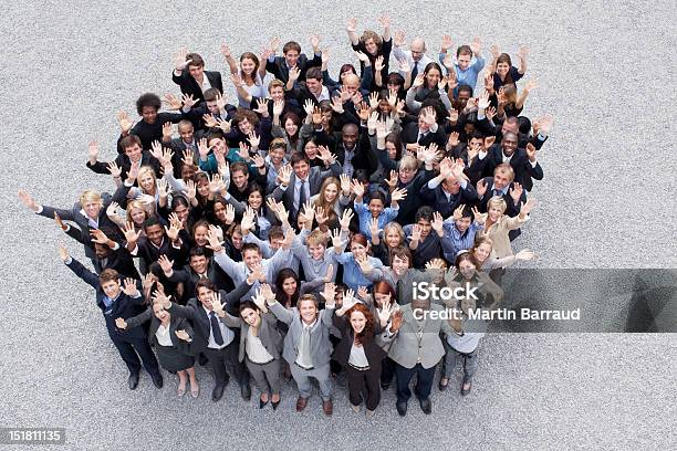 Portrait Of Waving Business People Stock Photo - Download Image Now - Large Group Of People, Business, Teamwork