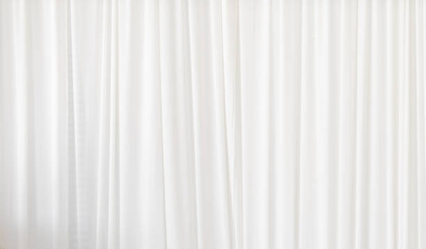 istock Soft white curtain surface with white grooves. 1518180911