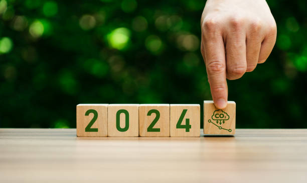 istock Businessman hand selecting CO2 2024 reduction icon. global warming, sustainable development, renewable energy business. climate change, carbon capture, storage, reuse, environmental 1518228552