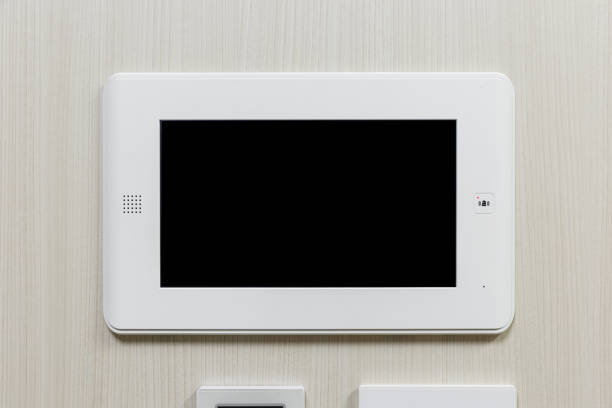 istock Videophone mounted on the wall with the black screen 1518233760