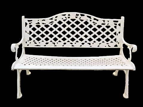 Isolated white iron bench on black background