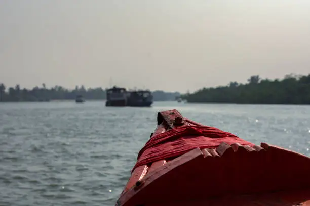 11th February, 2023, Sundarban, West Bengal, India: A tourist boat with tourists enjoying boat safari on river at Sundarban Tiger reserve, India.
