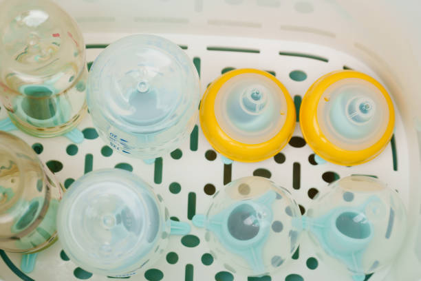 istock plastic baby milk bottle in Steam sterilizer 1518350407